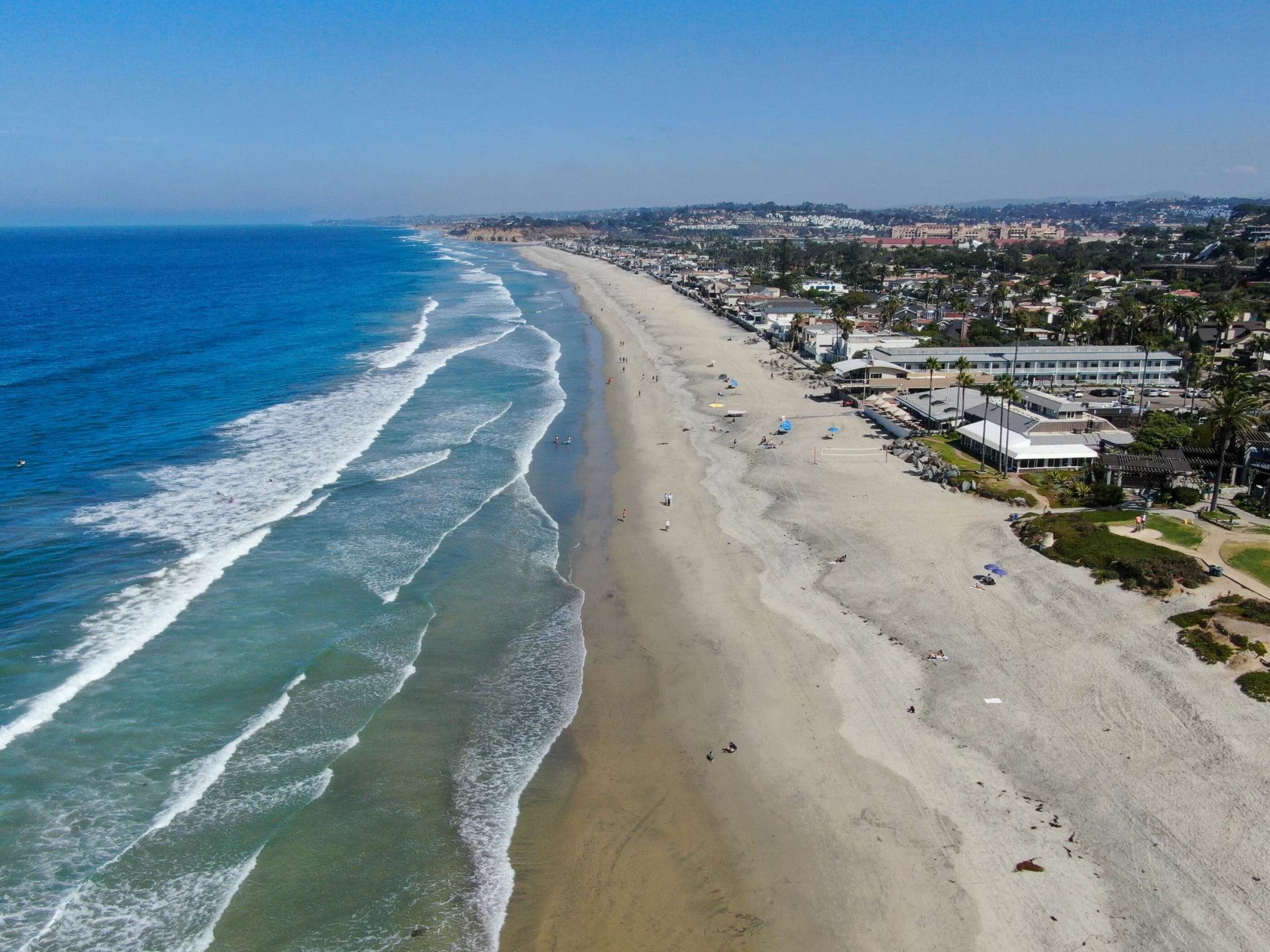 Aerial view of Del Mar City beach, showcasing the picturesque coastline and vibrant community.